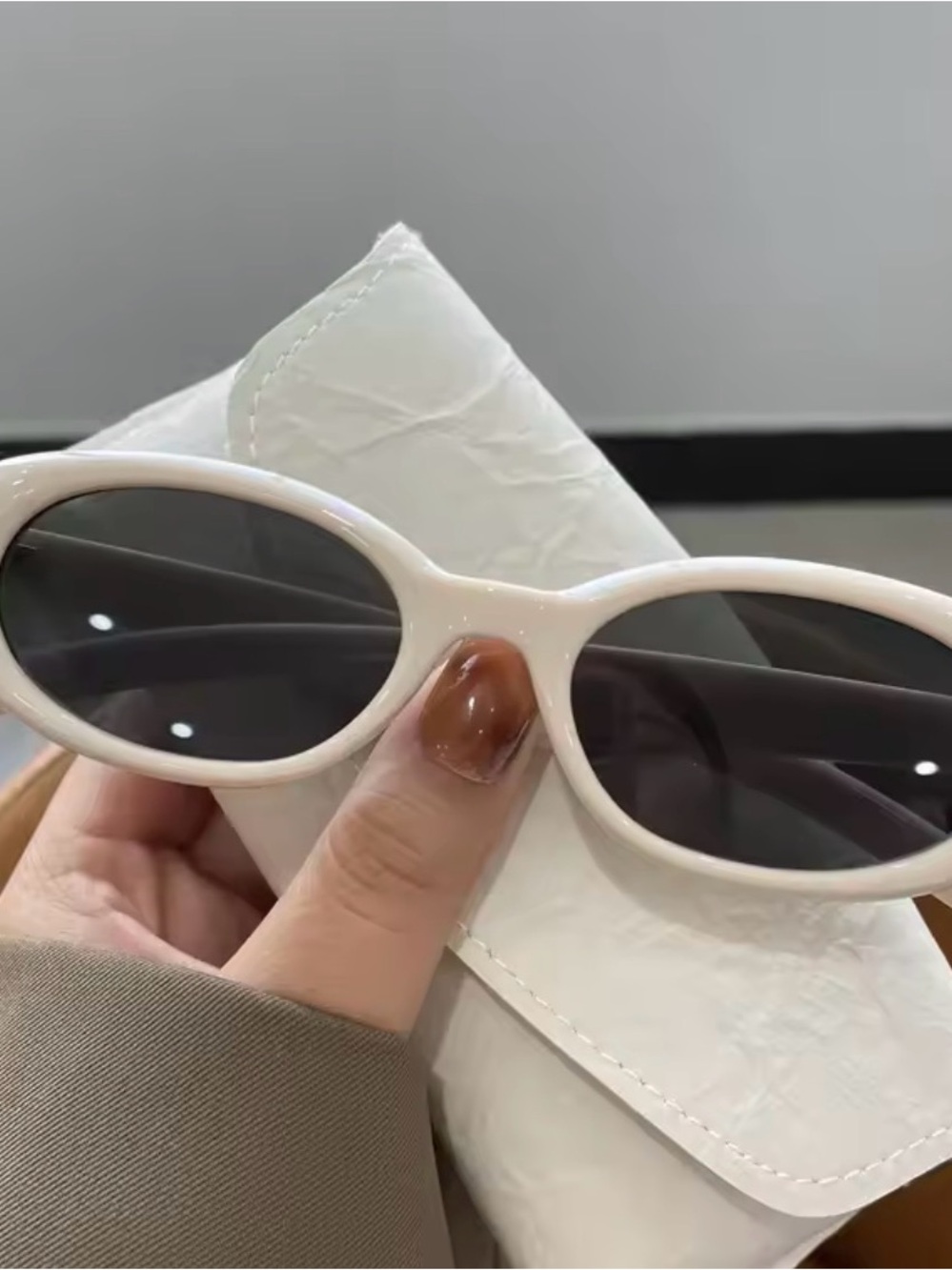 Classic White Oval Women’s Sunglasses with Dark Lenses